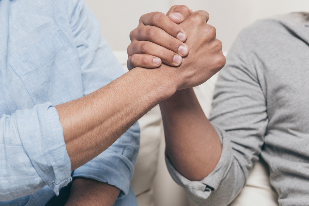 Men supporting one another in recovery